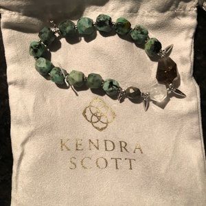 Stone bracelet with metallic accents